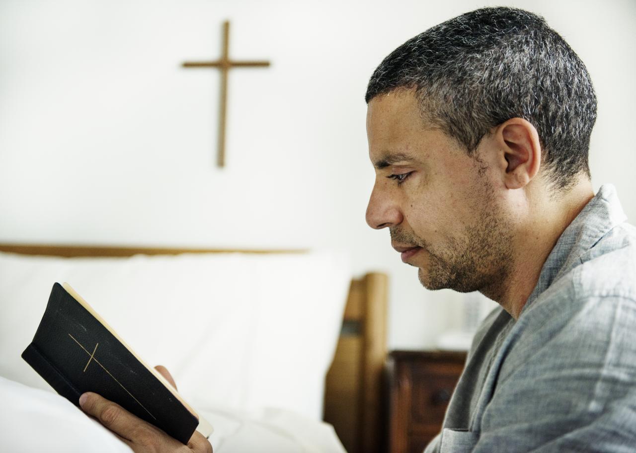 how to properly interpret scripture - christian man reading bible