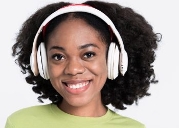 live at 5 - young-black-woman-smiling-while-listening