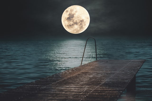 super moon over water