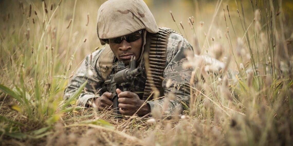 are you watching - soldier guarding with gun