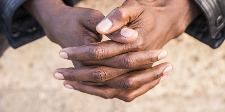 book of melchizedek - young-african-man-hands-folded
